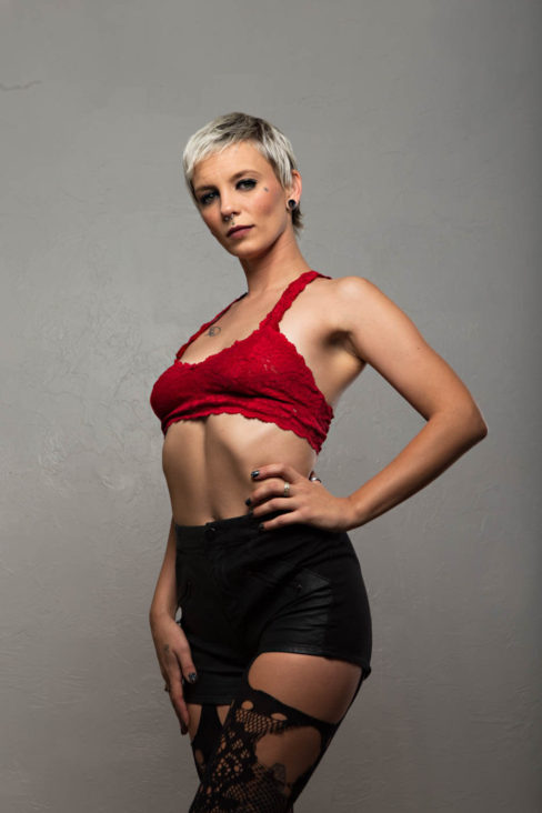 Image of Kel Bunn in red top and black shorts
